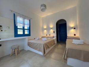 Katil atau katil-katil dalam bilik di Nikosgardenplacebythesea