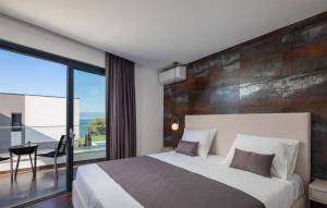 Posteľ alebo postele v izbe v ubytovaní Pet Friendly Apartment In Zidarici