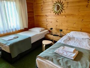 Guzowy PiecにあるDomek nad jeziorem Guzowy Piecのギャラリーの写真