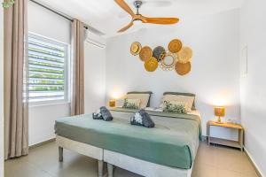 Postel nebo postele na pokoji v ubytování Paradise Apartments - Curacao
