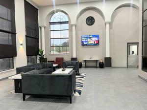 TV a/nebo společenská místnost v ubytování Motel 6-Brenham, TX