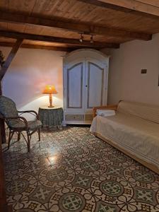 Postel nebo postele na pokoji v ubytování casa vacanze Filomena