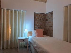 Postel nebo postele na pokoji v ubytování Largo da Fonte