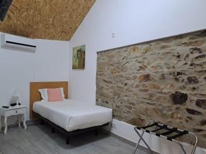 Postel nebo postele na pokoji v ubytování Largo da Fonte