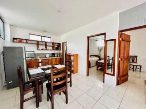 Kuchyň nebo kuchyňský kout v ubytování Cómodo apartamento familiar + 14 fotografií