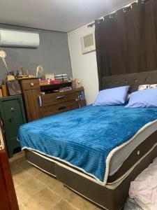 Ένα ή περισσότερα κρεβάτια σε δωμάτιο στο Casa de passeio com piscina +8 φωτογραφίες