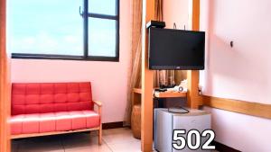 Televisyen dan/atau pusat hiburan di Xia Grli Inn