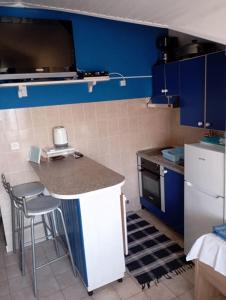 Kuchyň nebo kuchyňský kout v ubytování Apartments Ivo
