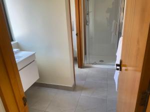 Koupelna v ubytování Allan Court Motel