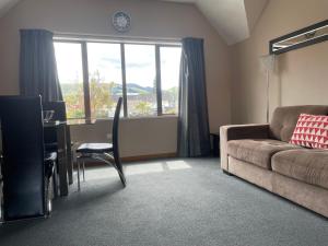 Posezení v ubytování Allan Court Motel