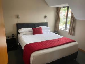 Postel nebo postele na pokoji v ubytování Allan Court Motel