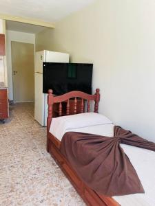 Una cama o camas en una habitación de Hospedaje Nono 21 fotos más