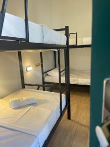 Postel nebo postele na pokoji v ubytování Grand'Hostel