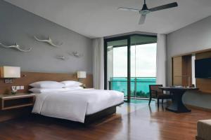 Rayong Marriott Resort & Spa客房内的一张或多张床位