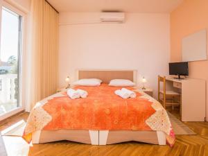 Postel nebo postele na pokoji v ubytování Apartment on Vir Island near Sandy Beaches