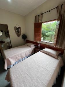 Reserva do Bosque Hospedaria e Natureza客房内的一张或多张床位