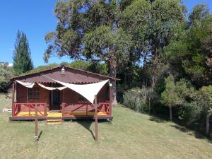 Κήπος έξω από το Cabaña Sunset , 6 personas , 2 cuartos a 3 cuadras de la playa