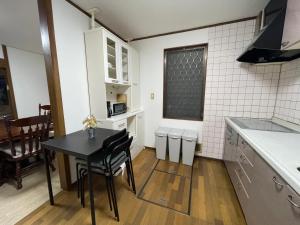 Kuchyň nebo kuchyňský kout v ubytování Slowhouse ZUSHI