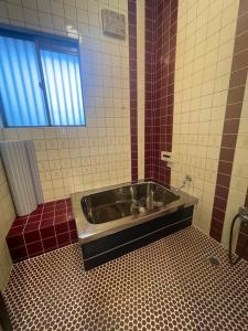 Koupelna v ubytování Slowhouse ZUSHI + 23 fotografií