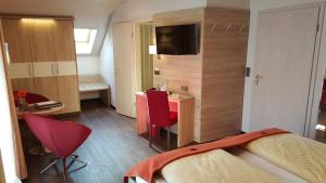 Postel nebo postele na pokoji v ubytování Hotel Koch