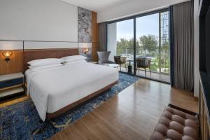 Four Points by Sheraton Bintan, Lagoi Bay客房内的一张或多张床位