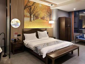 Qichi Waterfront B&B Hotel客房内的一张或多张床位
