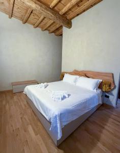 Postel nebo postele na pokoji v ubytování Il Carro Rooms - Monza Centro, Tribunale, Ospedale