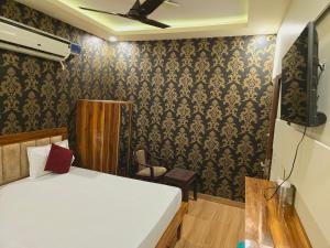 Postel nebo postele na pokoji v ubytování Hotel Marina