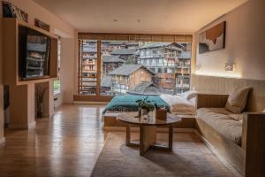 Posezení v ubytování Xijiang Qianhu Miao Village Mountain and B&B + 24 fotografií