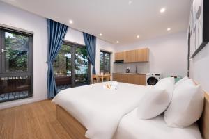 Kuchyň nebo kuchyňský kout v ubytování An Bang Spa & Apartment