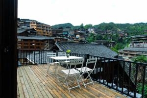 Balkón nebo terasa v ubytování Xijiang Qianhu Miao Village Mountain and B&B