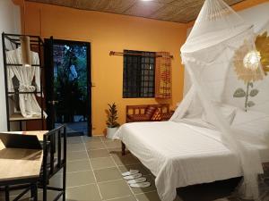 Voodi või voodid majutusasutuse Siem Reap Homesteading toas