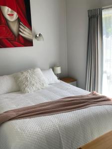 Postel nebo postele na pokoji v ubytování Jacks Place