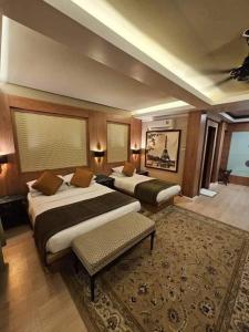 Postel nebo postele na pokoji v ubytování Sharilla Resort - Perhentian BS