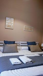 Postel nebo postele na pokoji v ubytování Hostal El Convent de Moncada