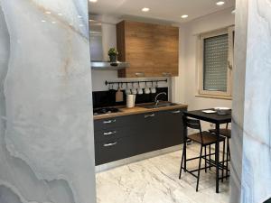 Kuchyň nebo kuchyňský kout v ubytování Blumoon boutique