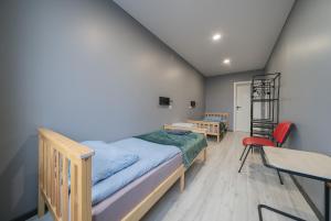Postel nebo postele na pokoji v ubytování Lollo Motel Graičiūno - Lollo Luxury