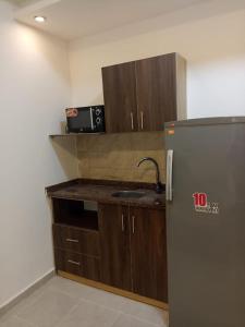 Kuchyň nebo kuchyňský kout v ubytování Casablanca beach resort 412