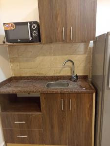 Kuchyň nebo kuchyňský kout v ubytování Casablanca beach resort 412