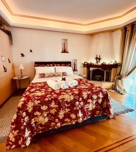 a bedroom with a large bed with towels on it at Dreamy Luxury Studio in Nafpaktos
