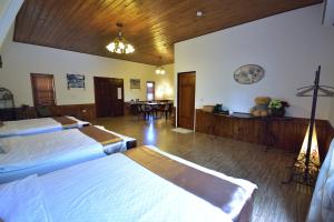Postel nebo postele na pokoji v ubytování Hou Niao Fei Xing B&B