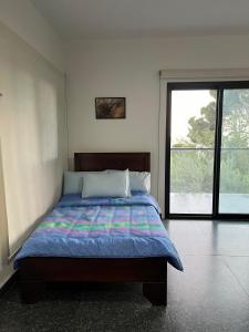 Ένα ή περισσότερα κρεβάτια σε δωμάτιο στο La Cueva Chalet