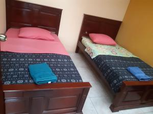 Postel nebo postele na pokoji v ubytování Hostal al Paso