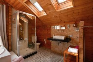 a bathroom with a shower and a sink at Natural Home Tarifa in Tarifa +36 photos