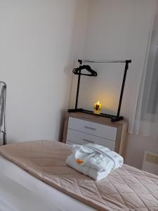 Krevet ili kreveti u jedinici u okviru objekta NINA 3 AKVA PARK adr Stevana Ivanovica 1