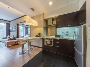 Kuchyň nebo kuchyňský kout v ubytování Micasa All Suites Hotel