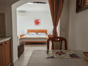Postel nebo postele na pokoji v ubytování Apartment Rosetta