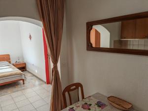 Postel nebo postele na pokoji v ubytování Apartment Rosetta