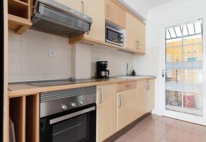 Kuchyň nebo kuchyňský kout v ubytování Villa Santa Ana 23