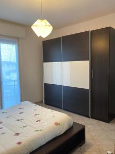 Postel nebo postele na pokoji v ubytování S a f e t y House Treviglio Milano